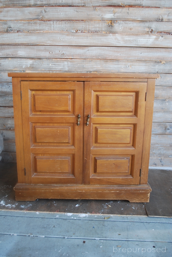 blue cabinet with arrow handles it was in pretty decent shape
