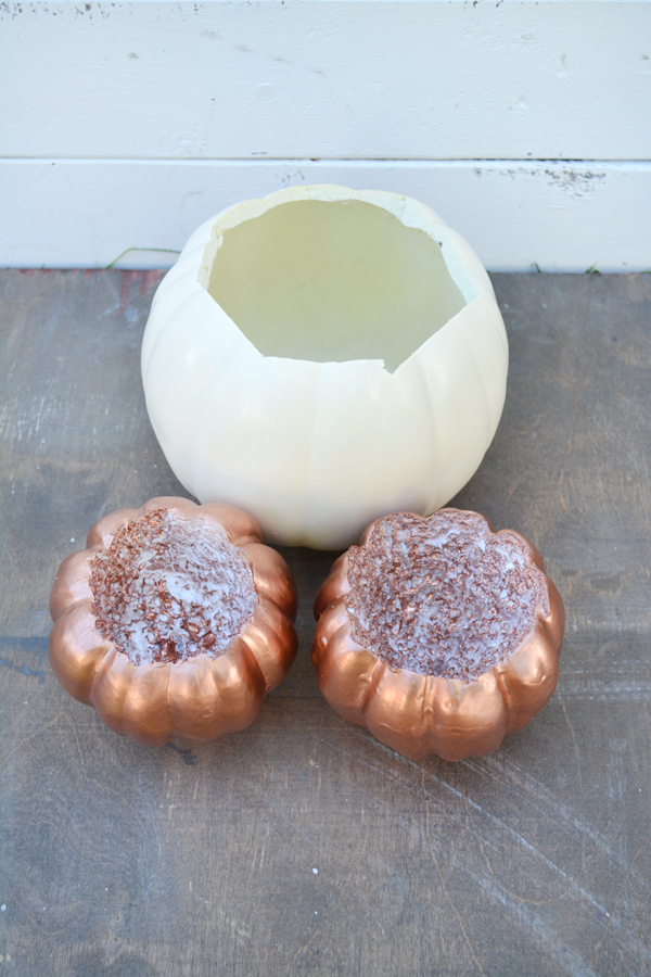 cut tops of plastic pumpkins to make planters