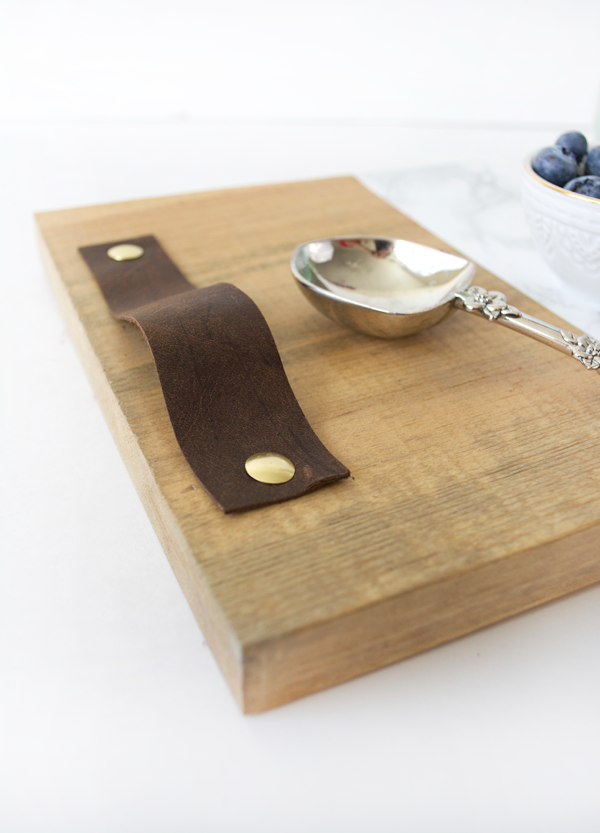 Leather straps on serving tray