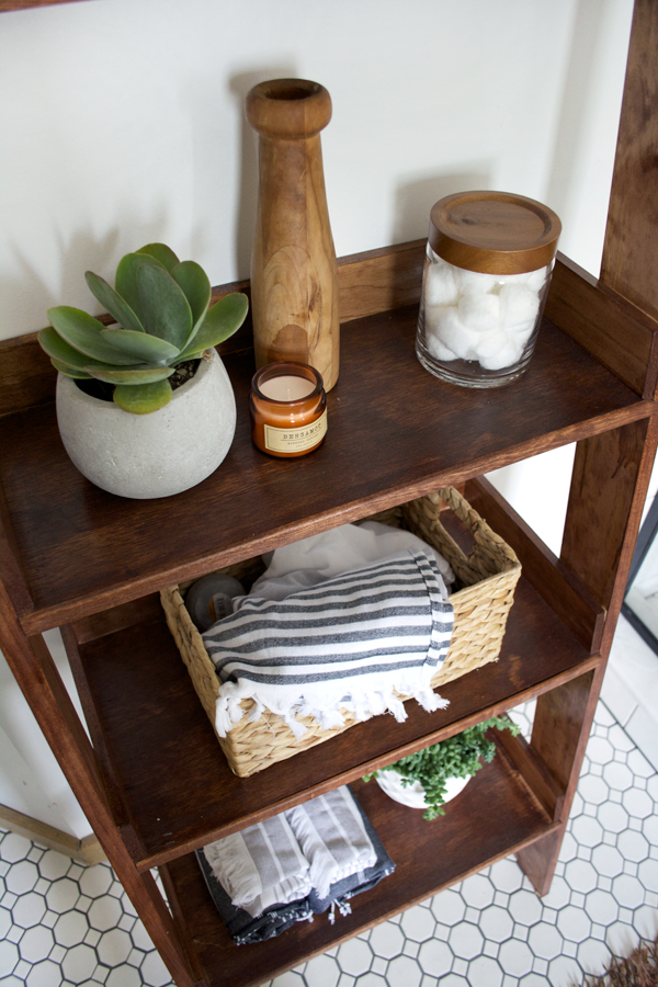 a diy leaning shelf in a modern vintage bathroom