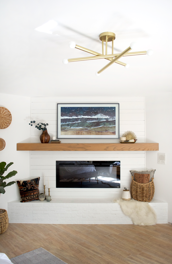 Simple and Modern Mantle Makeover with White Brick and Shiplap