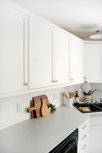 How to Add Trim and Paint Your Laminate Cabinets
