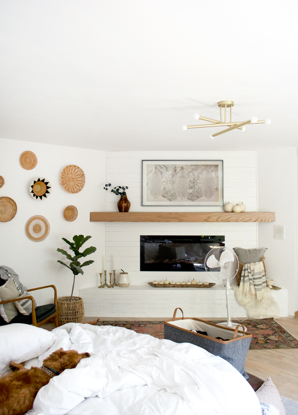 white mantle with shiplap and brick