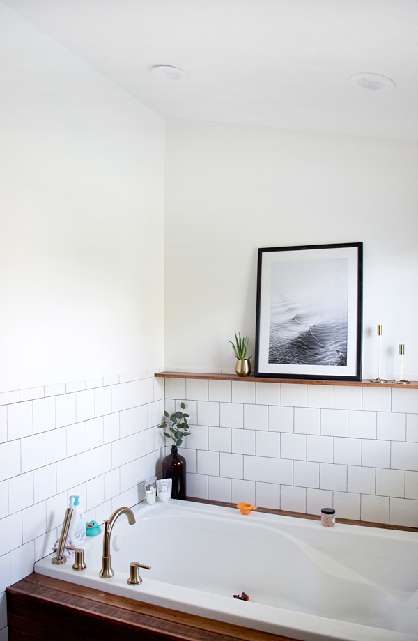 bathtub with wood surround