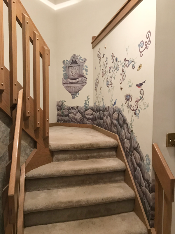 wooden stairs with carpet