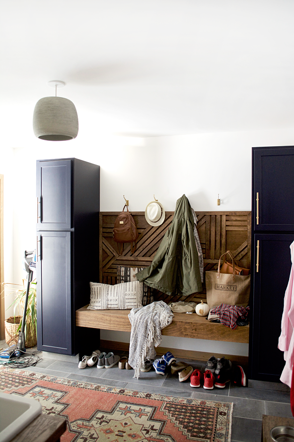 mud room with accent wood wall