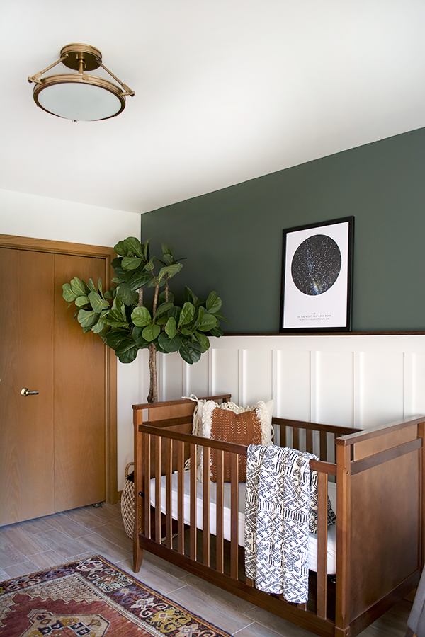 A board and batten wall in a modern nursery