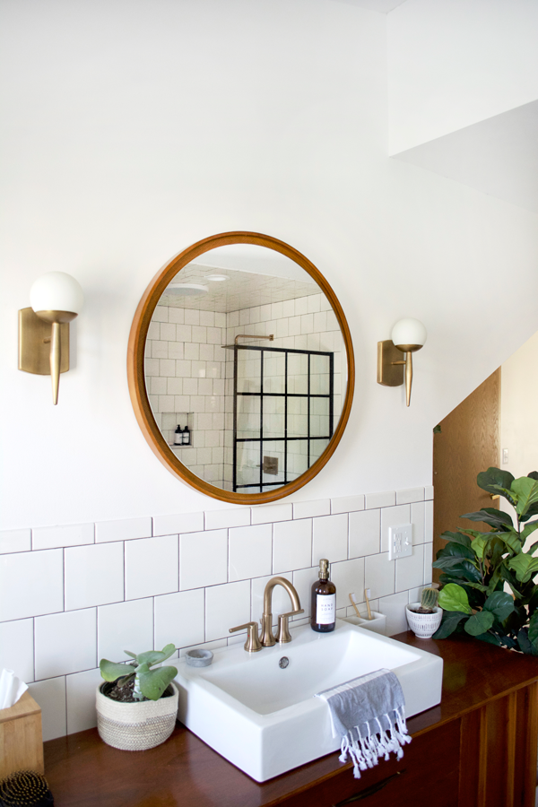 brass fixtures in a modern bathroom