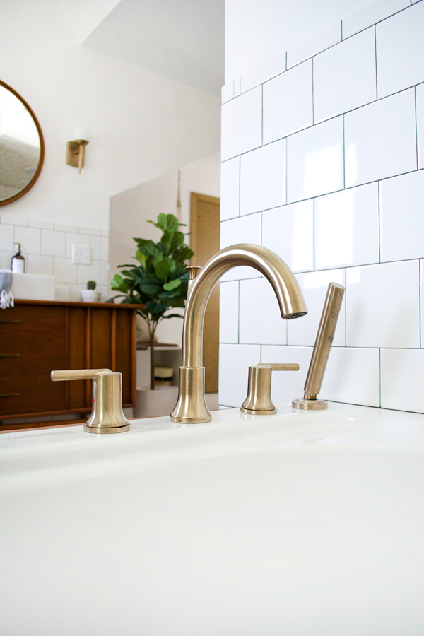Stylish and Functional Fixtures in a Modern Vintage Bathroom, brass fixtures, brass faucet, champagne bronze