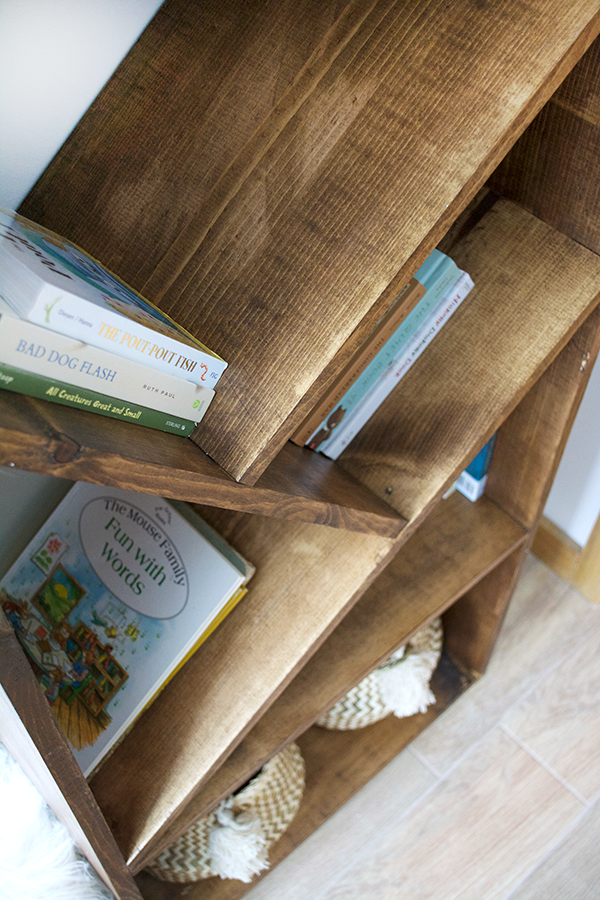 a unique bookcase with angled shelves