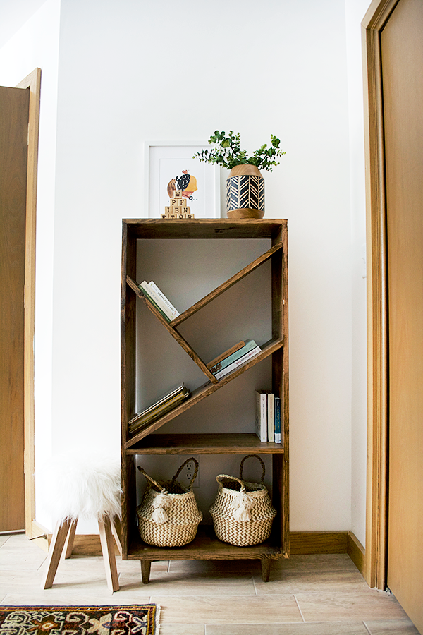 15. DIY Bookcase with Angled Shelves: