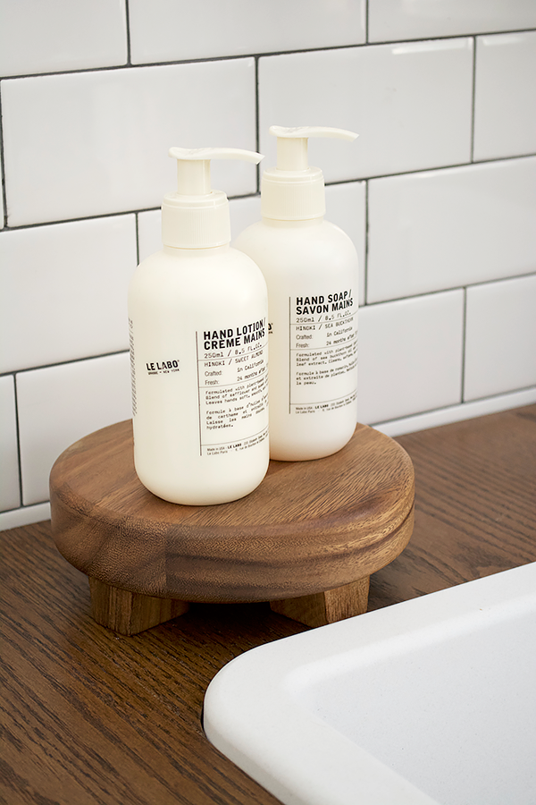 hand soap on a wooden stand