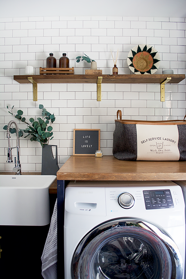 butcher block counters in a modern laundry room