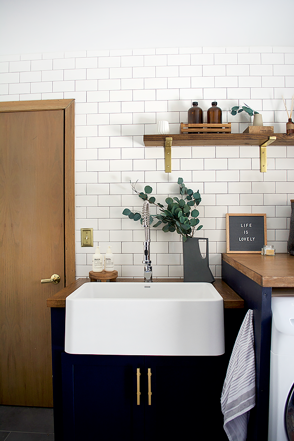 farmhouse sink in a laundry room