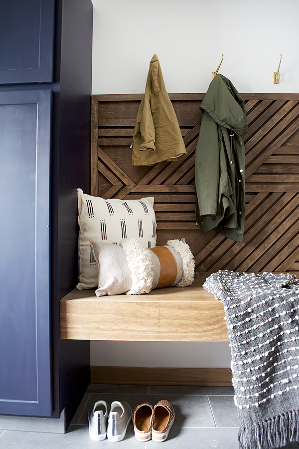 brass coat hooks in mud room