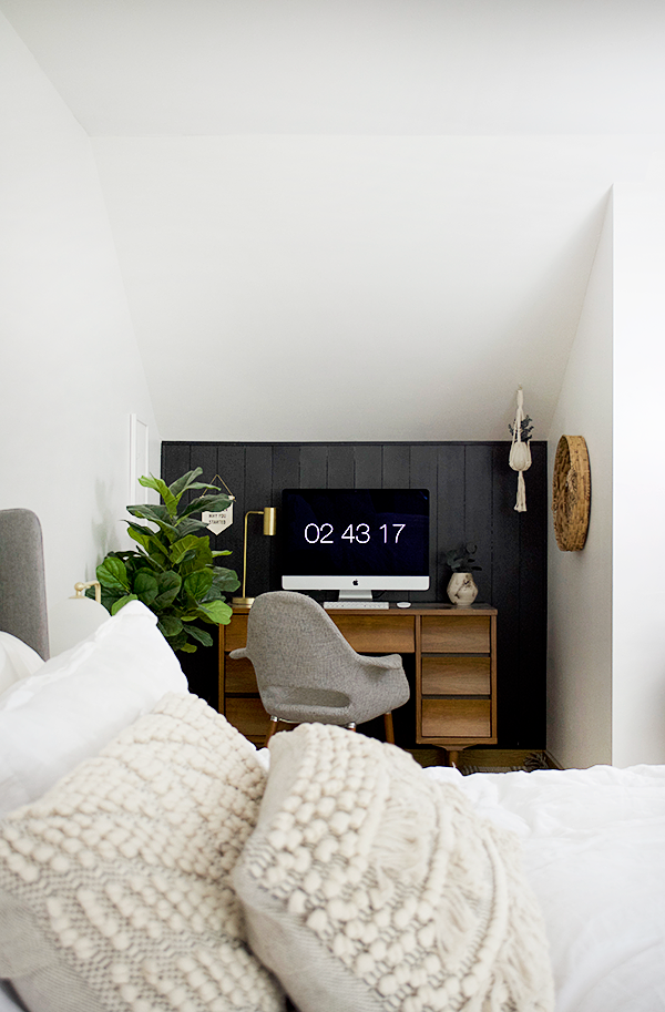 Dark vertical shiplap accent wall in an office nook