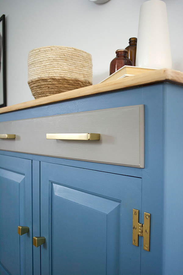 Brass Hardware on beautiful blue painted cabinet
