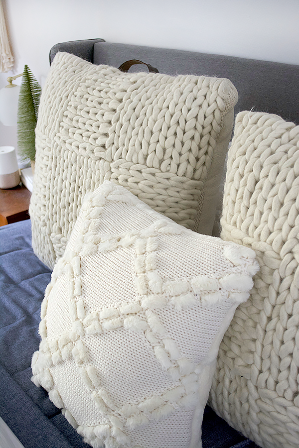 https://www.brepurposed.com/wp-content/uploads/2018/11/ugg-pillows-on-bed.png