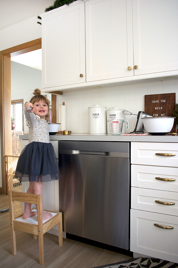 Little girl baking christmas cookies