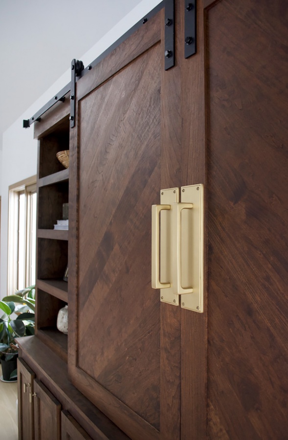 Brass handles on sliding barn doors