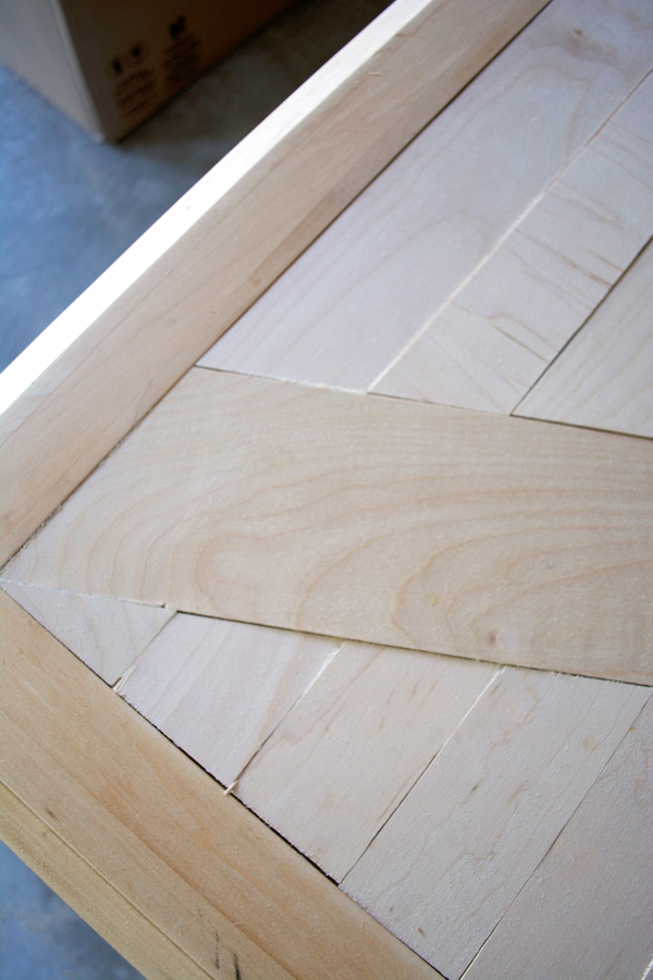 Geometric wood table top built for an old dining room table