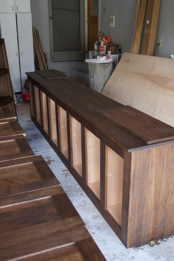Staining an entertainment center with sliding doors