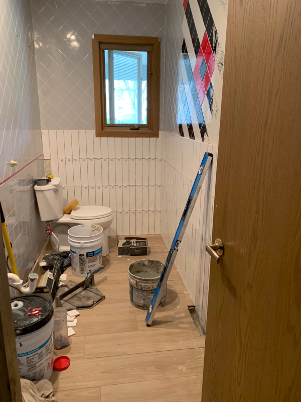 Stacked White Tile in a Half Bath Renovation