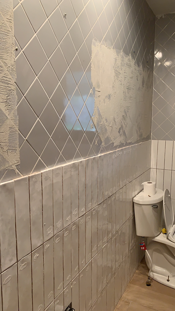 White Vertical Tile in the Bathroom