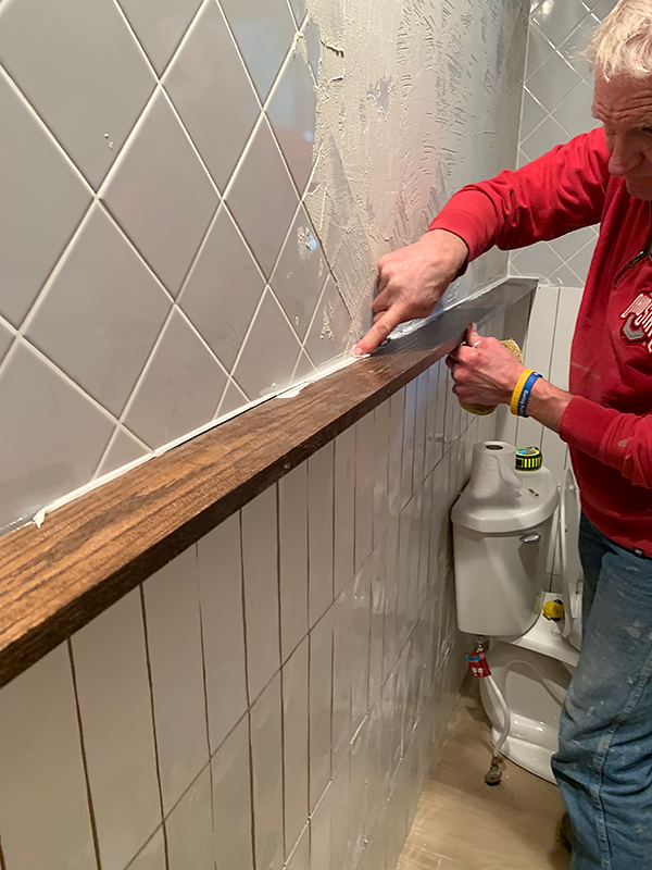 Caulking around a floating shelf