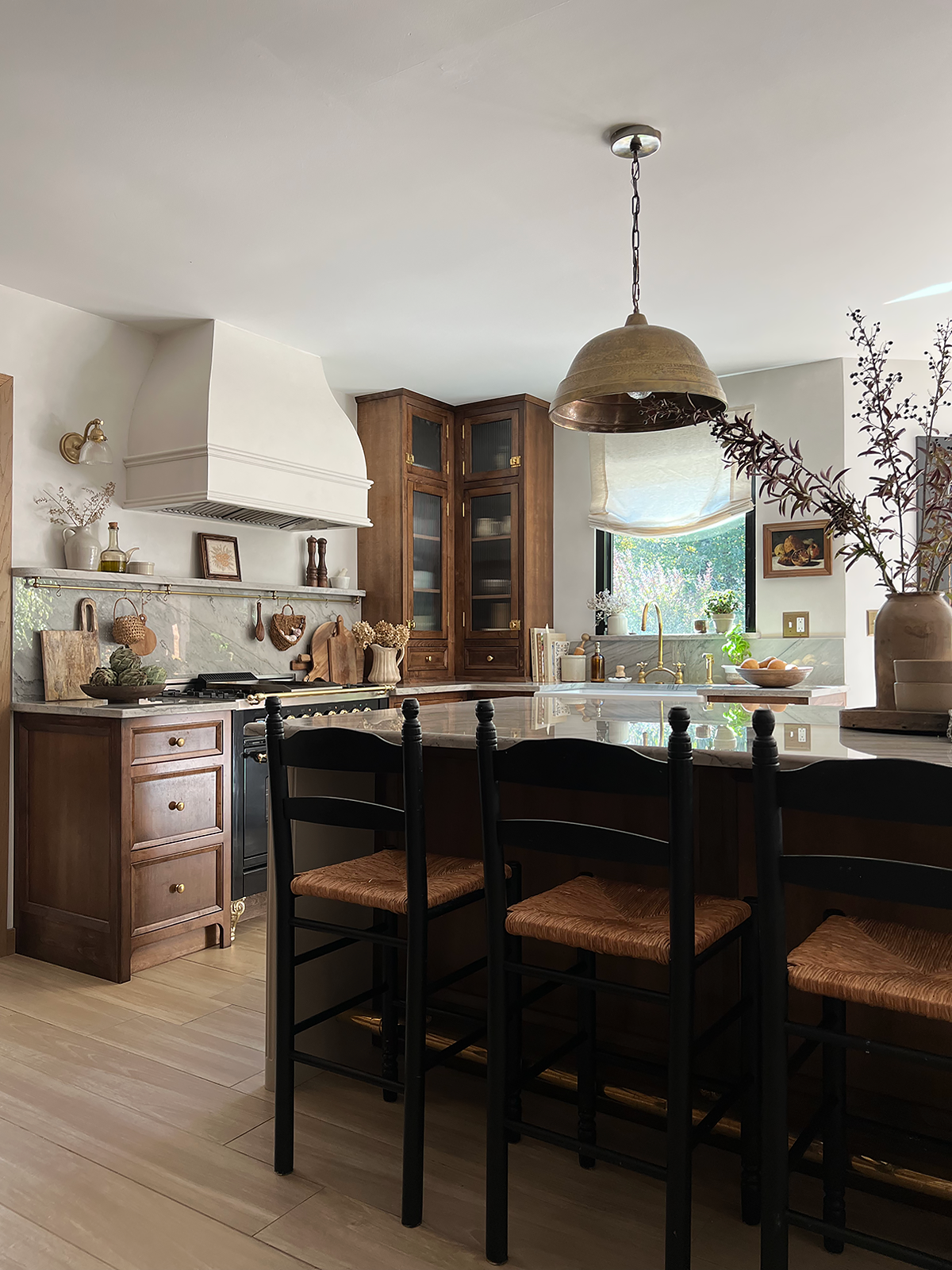 Brass Foot Rail in Kitchen With Wood Cabinets