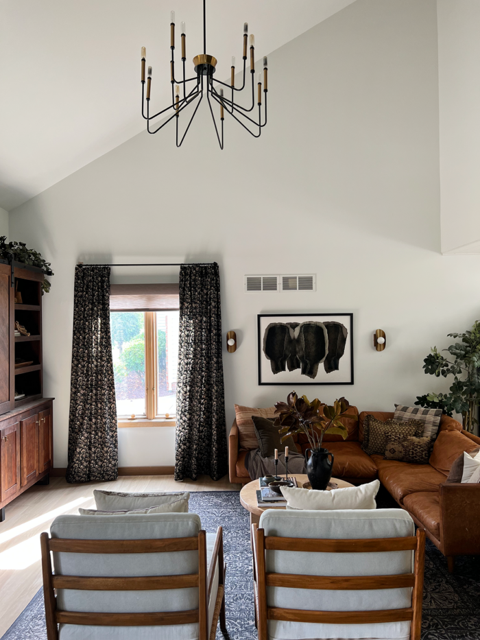 How to Make a Room Feel More Cozy with Window Treatments - BREPURPOSED - Textured Apartment Window Treatments For Cozy Living Room