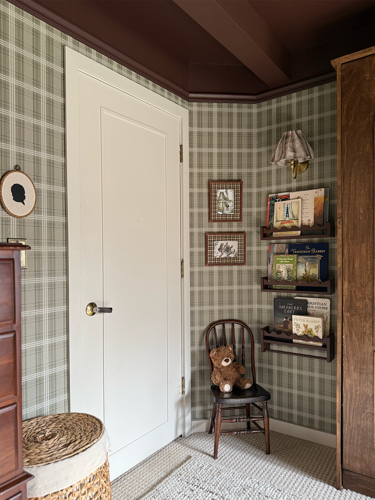 baby boy nursery with vintage decor and book shelf