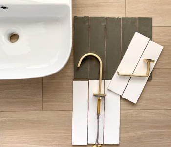 white and green tile in bathroom